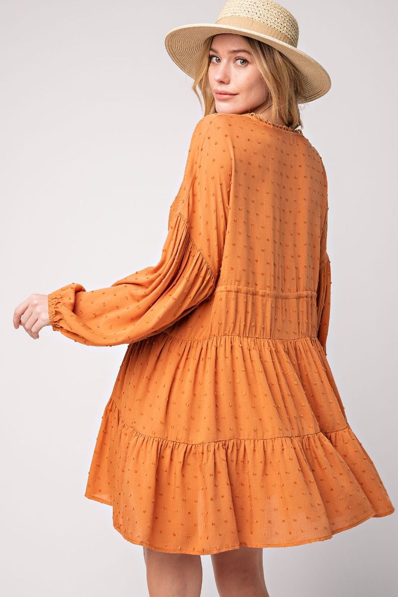 Easel Cinnamon Pompom Challie Swiss Dot V Neck Ruffle Bottom Flowy Dress - Roulhac Fashion Boutique