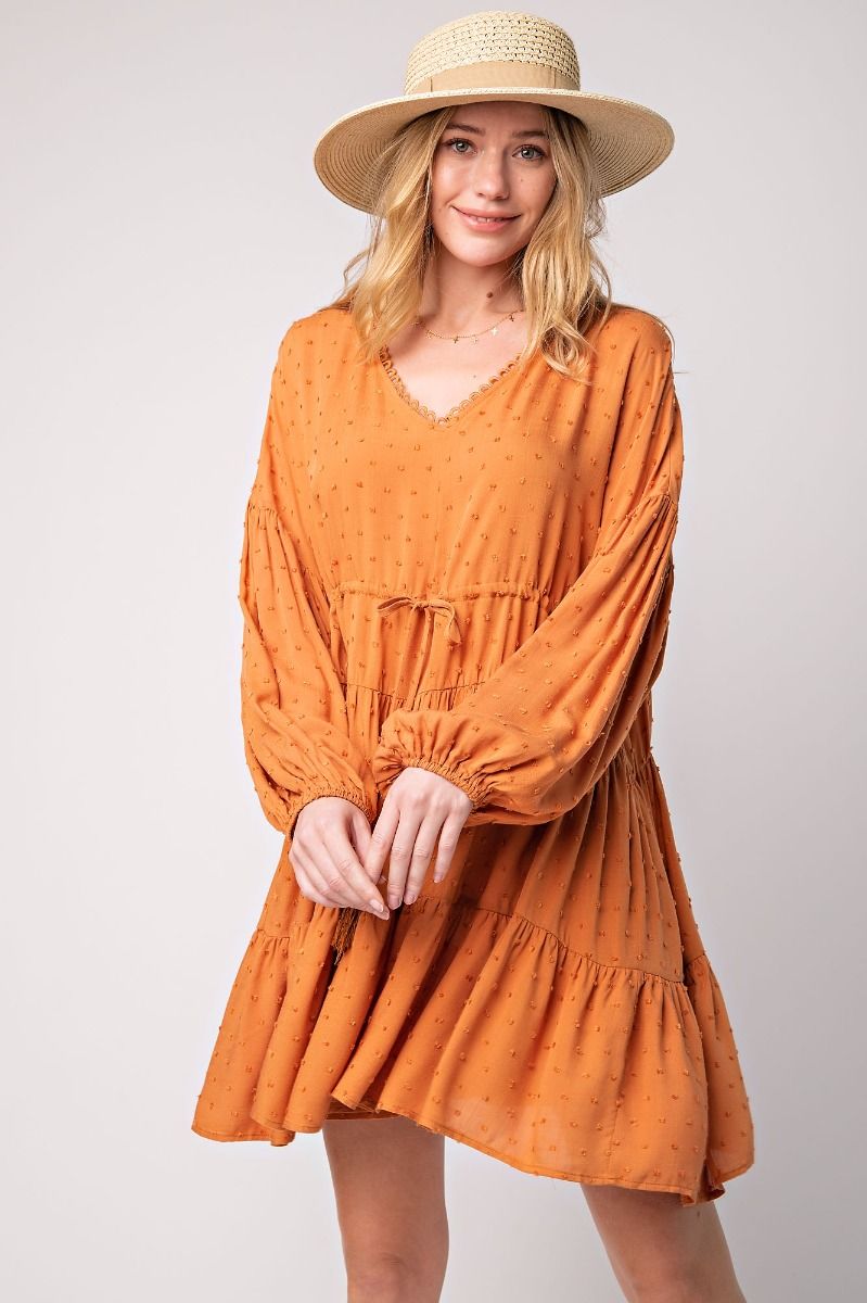 Easel Cinnamon Pompom Challie Swiss Dot V Neck Ruffle Bottom Flowy Dress - Roulhac Fashion Boutique